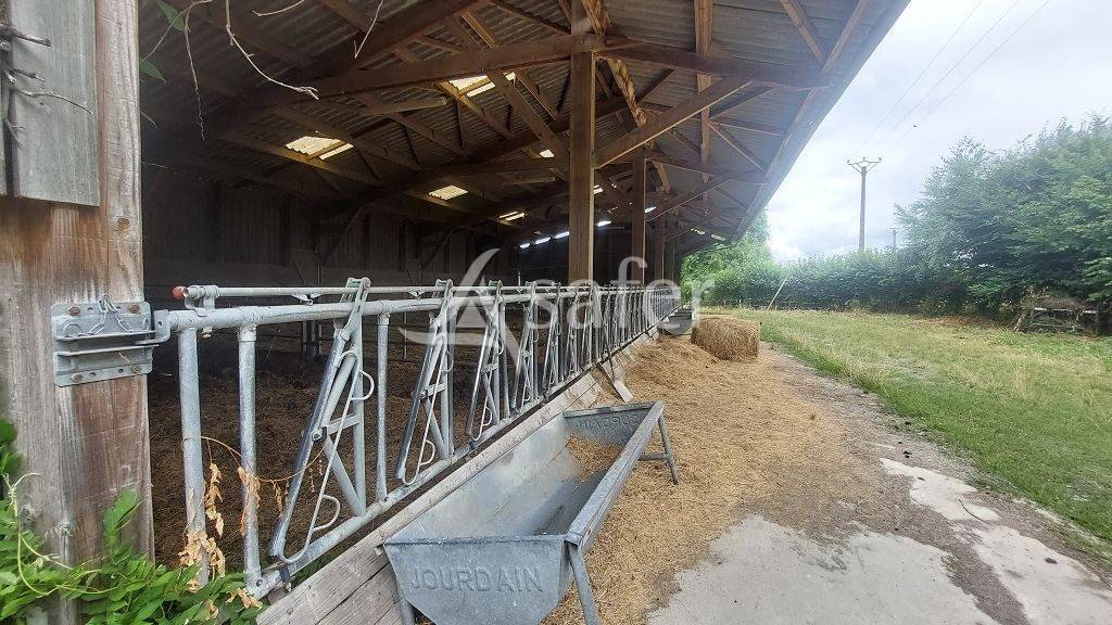 Exploitation agricole d'environ 51 ha avec habitation et bâtime